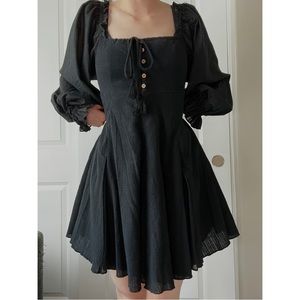 XS black mini dress. It has pockets!